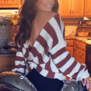 Orange and cream striped sweater